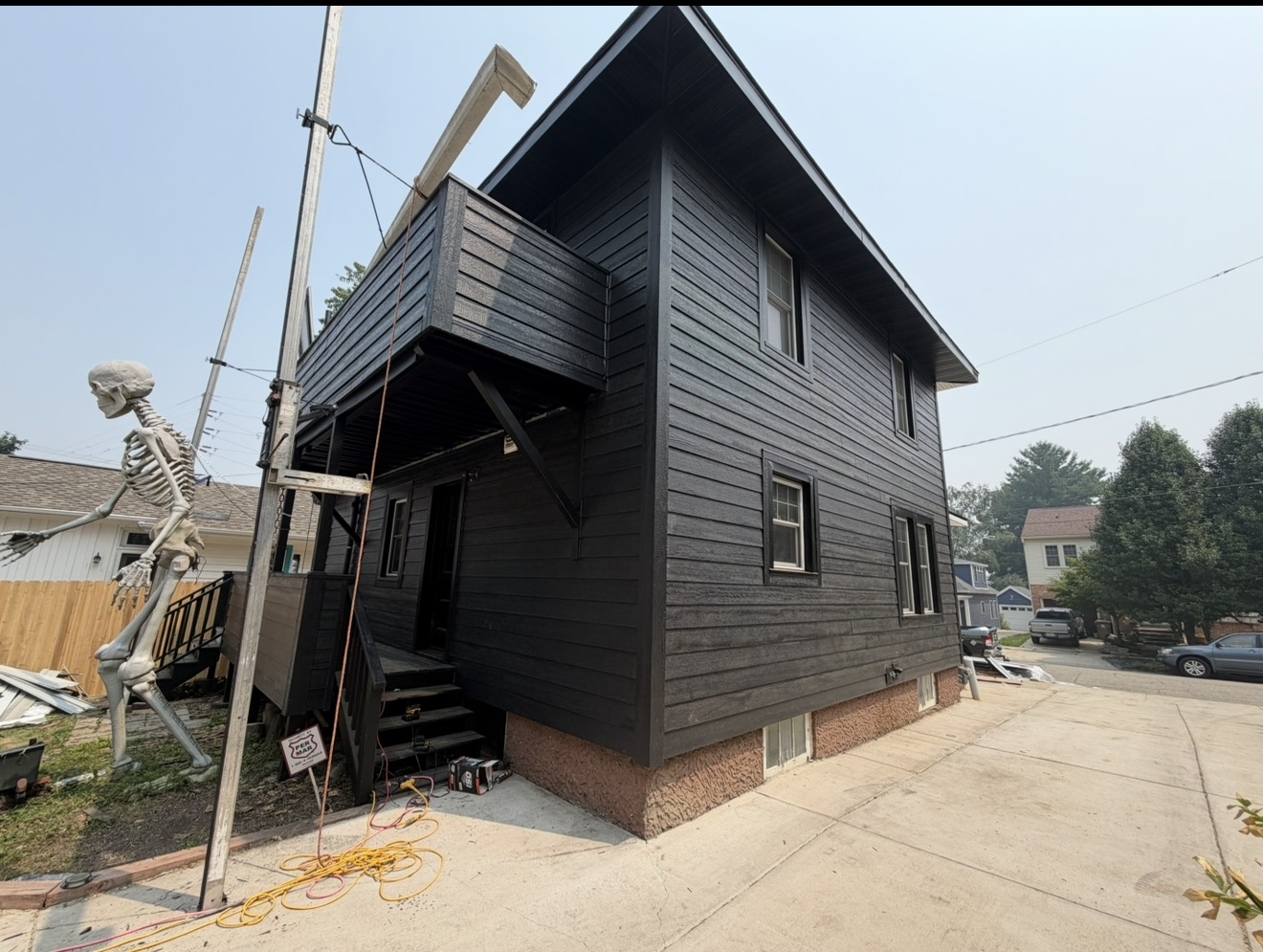 Modern black lap siding installed by Bold Brothers